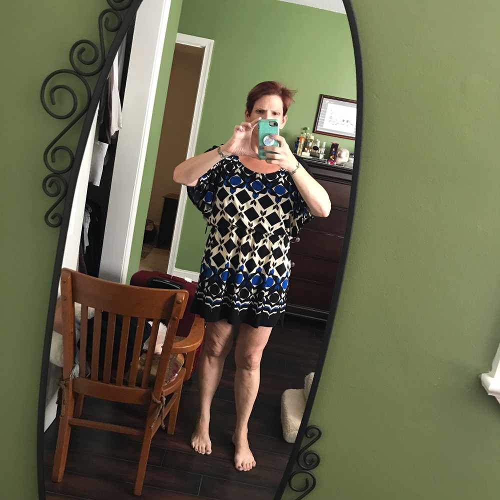 XL Never worn dress with cinched waist.